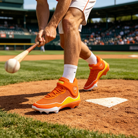 Chaussures de sport unisexes pour baseball et softball, tige mi-haute en microfibre, doublure en mesh, semelle extérieure entièrement en caoutchouc moulé, pour entraînement sur terrain.
