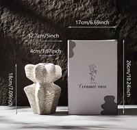 Vase en céramique moderne Wabi-Sabi avec finition mate et texture naturelle pour la décoration quotidienne de la table à manger