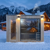 Sauna extérieur moderne en bois massif avec douche intégrée et poêle à bois