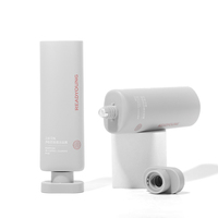 Tube cosmétique en PE gris clair mat de 100 ml avec bouchon à vis ovale plat, emballage élégant et féminin pour lotion corporelle