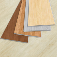 Revêtement de sol en plastique SPC à base de matériaux vierges, texture bois et pierre personnalisée, pour projets d'ingénierie de construction