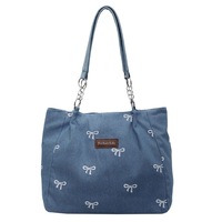 Sac fourre-tout en jean pour femme avec broderie nœud, grande capacité, sac à main décontracté avec bandoulière chaîne pour l'école, le travail et l'usage quotidien