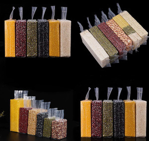 Custom Size 0.5 Kg Food Grade Pa Pe Disposable Fresh Transparent Corn Grains Nuts Vacuum Packaging Rice Brick <b>Bag</b> With Handle - Product Image 2