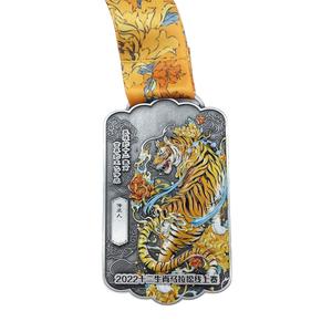 เหรียญรางวัลกีฬาโลหะสีทองขายดี พร้อมริบบิ้น ลายเสือ - Product Image 1