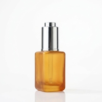 Flacon compte-gouttes carré de luxe 30 ml en verre ambré mat avec protection UV, flacon de sérum givré avec pompe à pression argentée pour huile visage