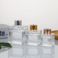 Meilleure vente : Bouteille carrée transparente en verre pour diffuseur d'huiles essentielles à bâtonnets, avec bouchon à vis et bâtonnets parfumés