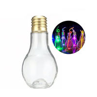 Bouteilles LED en forme d'ampoule personnalisées avec logo imprimé, contenants vides pour bonbons ou liquides, de 100 ml à 500 ml, pour fêtes et événements.