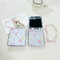 Coque de téléphone transparente à imprimé floral pastel pour Samsung Galaxy Z Flip 7-3 avec breloque fleur rose et sangle perlée – Protection élégante pour le printemps