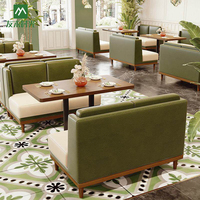 Ensemble de table et chaises de salle à manger carrées en bois avec structure métallique, style moderne, pour hôtels, restaurants et cafés, avec banquette intégrée.