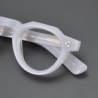 Monture de lunettes épaisse en acétate blanc transparent avec plaque en acétate orange, monture de lunettes épaisse à motif répétitif imitation écaille de tortue ancienne