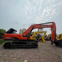 Excavatrice hydraulique d'occasion Doosan DH300LC-9 importée de Corée, haute puissance et durable, pour travaux de terrassement en montagne, démolition de bâtiments et développement