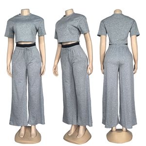 Ensemble décontracté pour femme : Crop top et pantalon large en tricot de spandex couleur unie, manches courtes, col rond, deux pièces - Product Image 2