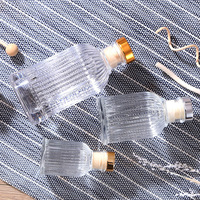50ml 100ml 150ml 200ml 500ml Bouteille d'aromathérapie en verre transparent Bouteille vide Bouteille de diffuseur de parfum en rotin sans feu