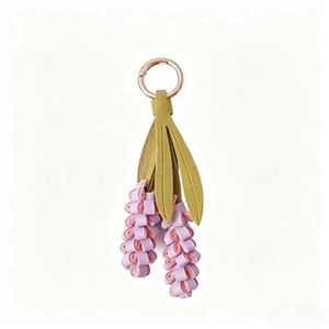 Cute Leather Keychain With Purple Flower Design And Gold Ring For Bag Charm - Product Image 1