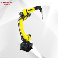 Robot Industrial FANUC M-10iD/8L Equipado con una Vía de Suelo en Voladizo para una Estación de Trabajo de Soldadura por Haz.