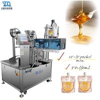 Machine automatique haute vitesse de remplissage et de bouchage de sachets à bec verseur pour liquides et pâtes, avec alimentateur de bouchons à bol vibrant, pour miel et applications d'isolation thermique en usine
