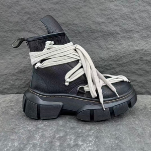Botas cortas de caña alta, elegantes y cómodas, de cuero de alta calidad, aptas para hombres y mujeres, para uso casual y deportivo. - Product Image 1