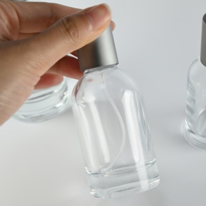 Offre Spéciale <span class=keywords><strong>Labo</strong></span> Bouteilles de parfum à étiquette personnalisée rondes de 30ml 50ml 100 ml Flacon vaporisateur de parfum en verre unique avec couvercle en argent - Product Image 5