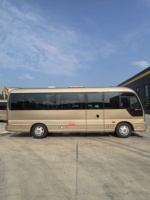 Mini-bus de luxe confortable à 29 places, moteur diesel D4GA, transmission manuelle, bus Coaster d'occasion