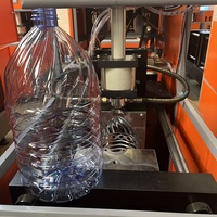 Machine de soufflage semi-automatique de bouteilles de 3 gallons Machine de fabrication de bouteilles en PET Prix Machine de moulage par soufflage Bouteille d'eau de 5 gallons