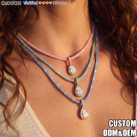 CAIOOCHE Collier pendentif tressé délicat avec perle en oxyde de zirconium, cordon coloré personnalisé rose et bleu, plaqué or, bijoux pour femmes en gros