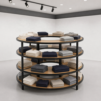 Table de présentation de vêtements rotative ronde à 4 niveaux en MDF et métal, présentoir de vêtements pour la vente au détail