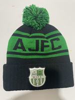 Bonnet en tricot de boules de fourrure de couleurs mélangées avec logo personnalisable motif d'arcs à pois brodés en 3D pour la plage ou les affaires Vente en gros
