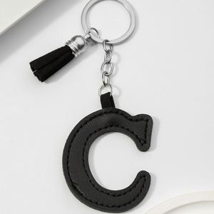 Nouveauté 2025 : Porte-clés en cuir PU avec 26 lettres anglaises et pompons en cuir colorés pour pendentif lettre nominative – Cadeau spécial - Product Image 4
