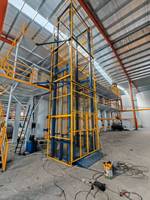 Monte-charge hydraulique vertical stationnaire robuste avec système de protection de sécurité