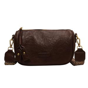 2025 nuevo bolso pequeño popular para mujer, bolso de mensajero de hombro de banda ancha versátil a la moda, bolso de cabeza Retro - Product Image 1