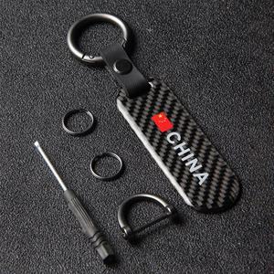Toptan özel karbon Fiber araba logolu anahtarlık Metal OEM baskı boş UV anahtarlıklar ile toplu yüksek miktar - Product Image 1