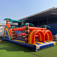 Parcours d'obstacles gonflable commercial pour enfants, avec toboggan et structure de saut en forme de palmier, jeu sportif