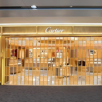 Porte de magasin pliante manuelle moderne en cristal PC, cadre en aluminium fini, solution complète pour usage commercial en centre commercial
