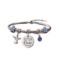 Bracelet en acier inoxydable électroplaqué pour femme, pendentif ailes d'ange dorées, gravure laser, zircon, pierre de naissance, cadeau, modèle Yiwu