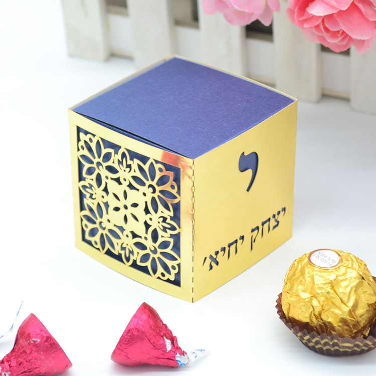 Caja interior azul marino, manga exterior oro metálico