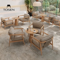 Ensemble de canapé, chaise et table en bois massif pour réception et négociation d'hôtel, style nordique de luxe, idéal pour les maisons d'hôtes et les salons de café-thé.