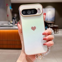 Coque de téléphone antichoc en TPU avec bracelet en cristal électroplaqué et motif cœur pour Google Pixel 9 Pro – Meilleure vente