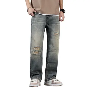 Calça jeans masculina, jeans retrátil com buracos soltos de alta qualidade, estilo rasgado, 100% algodão, grande, moda masculina