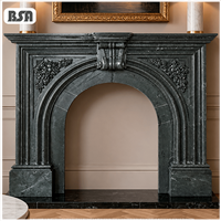 Cheminée en marbre noir de style antique BSA, sculptée à la main, avec un relief floral et fruité, pour villa, intérieur