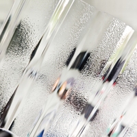Tôle de toiture en polycarbonate ondulé gaufré à transmission de lumière variable de 50 % à 90 %