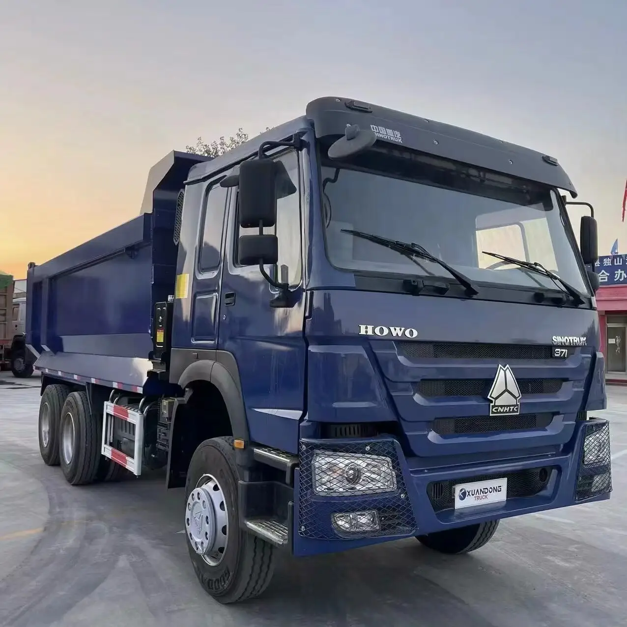 2021 चीनी प्रयुक्त नीला 6x4 10 व्हील 60 टन 371HP बिक्री के लिए सबसे कम कीमत के साथ अच्छी स्थिति वाला डम्पर ट्रक।