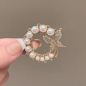 Broche papillon en alliage de zinc, minimaliste, haut de gamme, luxe léger, niche, simple, élégante, épingle à vêtements fixe, accessoire de costume en perle - Product Image 1