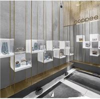 Vitrine de présentation de bijoux de luxe en acier inoxydable écologique avec éclairage LED, vitrine en verre commerciale pour magasin de détail haut de gamme