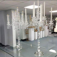 Le plus populaire lustre bougeoir de mariage en cristal clair de haute qualité à 9 bras pour la décoration de table de mariage