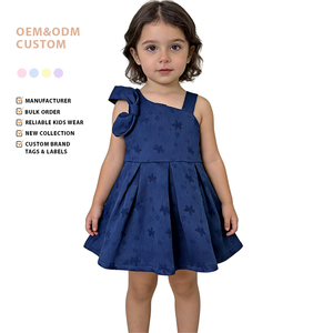 Abito Estivo per Ragazze in Tessuto Premium Jacquard Blu Navy con Fiocco Oversize Monolaterale e Gonna Svasata con Vita Stretta Servizio ODM - Product Image 1
