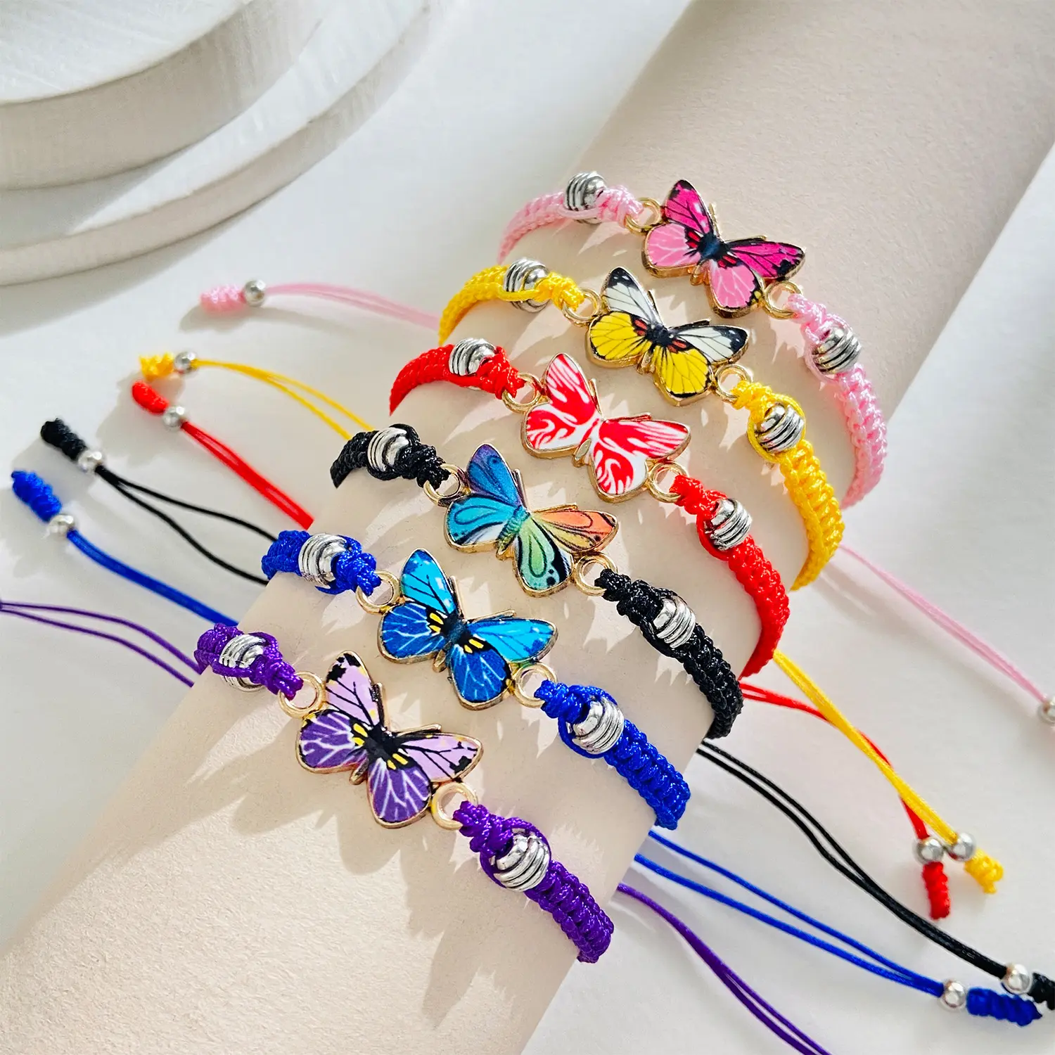 Venta al por mayor de moda hecha a mano joyería tejida cuerda ajustable trenzado mariposa encanto pulsera