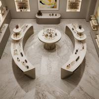 Meuble de présentation cosmétique incurvé moderne sur mesure, comptoir îlot en métal pour parfums, vitrine murale LED pour magasin de beauté de luxe