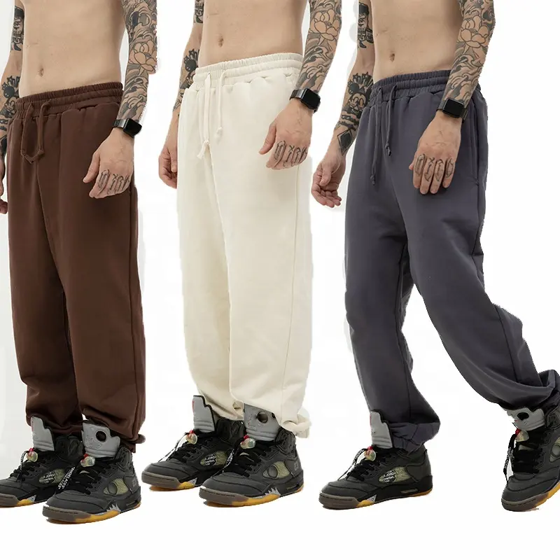 हेवीवेट पुरुषों और महिला सामान्य स्वेटपैंट थोक कस्टम लोगो पैंट उच्च गुणवत्ता वाले पुरुषों की ढीली स्वेटपैंट मुद्रित