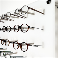 Support mural en acrylique de haute qualité pour présentoir de lunettes optiques