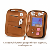 Portefeuille de voyage multifonction en cuir PU de luxe A5 avec logo personnalisé RFID, porte-passeport zippé pour documents, idéal pour les voyages d'affaires 2026